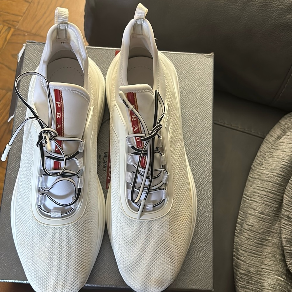 Prada Sneakers 
Brand new 
Please see all photos 
A few spots of discoloration